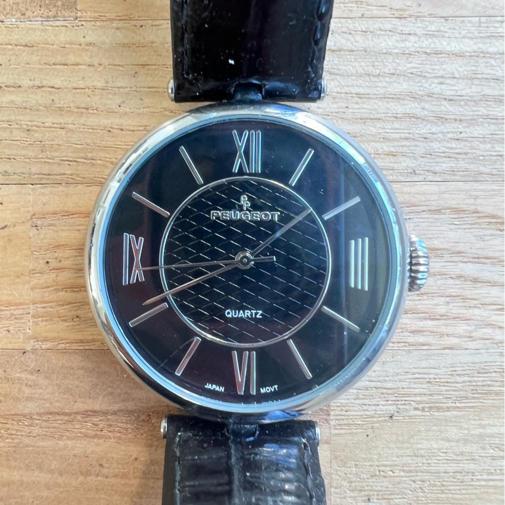 Peugeot ladies black dial black leather dress watch NEW BATTERY